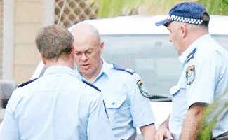Getaway: Police collar a suspect after a chase through the problem laneway. Getaway: Police collar a suspect after a chase through the problem laneway.
